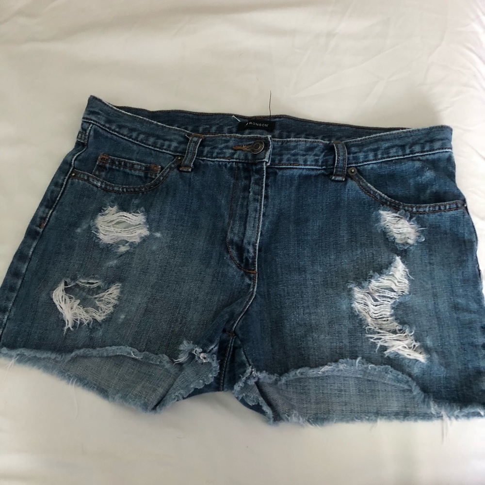 Pair of ripped denim shorts